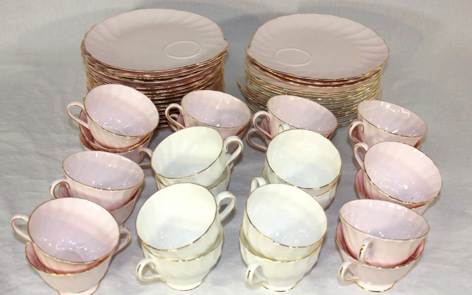 Tuscan English Pink & White Porcelain China Set: Made in England. Includes 25 tea cups and 29 dessert plates with tea cup rest.