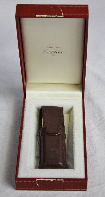 Cartier Perfume Dispenser in Leather Pouch: In original box with instruction leaflet. Height 3.5 Inches Property of a Westport, CT estate