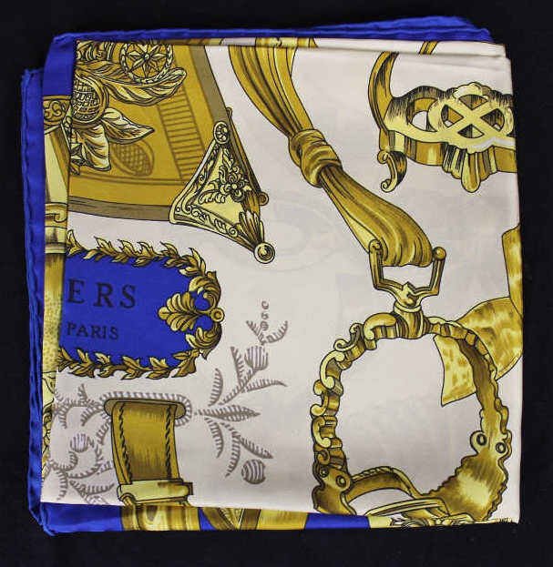 Hermes "Etriers" Scarf: Blue border with gold design Property of a Westport, CT estate