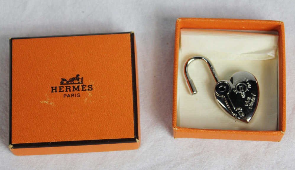 Hermes Heart and Key Silvertone Cadena Lock: Vive l'Idee from the Hermes Annee de la Fantaisie (2004). Comes in original box. Property of a Westport, CT estate
