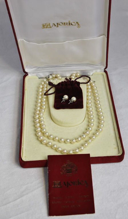 Majorica Double Strand Simulated Pearl Necklace: Approximately 19 Inches long. In original box with certificate. Clasp marked 925. Property of a Westport, CT estate