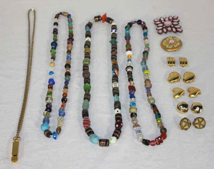 Group of Costume Jewelry: Two pins, one group of beaded necklaces, one whistle necklace, and five sets of clip-on earrings