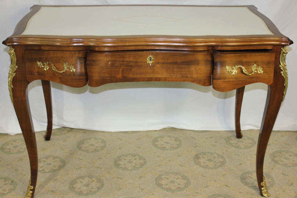 Queen Anne Style Desk: With white imitation leather top Height 30.5 Inches Width 45 Inches Depth 24 Inches