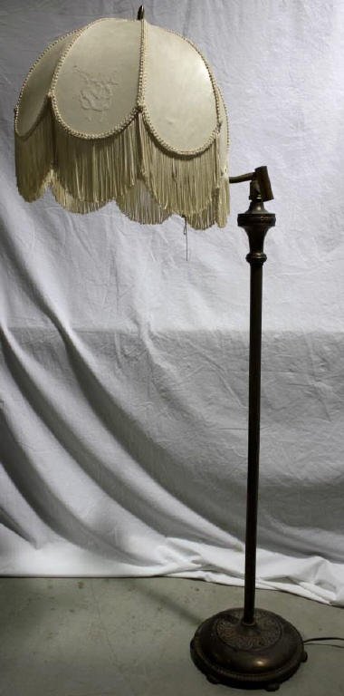 Brass Floor Lamp: with fringed lamp shade Height 54 Inches Diameter of shade 15 Inches