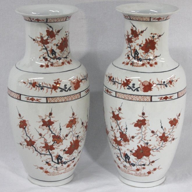 Pair of Hand Painted Asian Floral Vases: Marked on the bottom Y.T Decorated in Hong Kong Height 18 inches Width 8 inches
