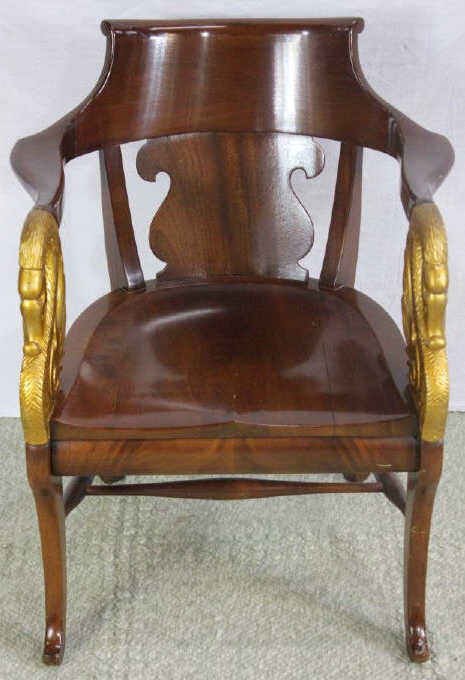 Hand Carved French Empire Style Arm Chair: Having 2 carved swan supported arm rests. Height 32 inches. Width 26 inches. Depth 22 inches.