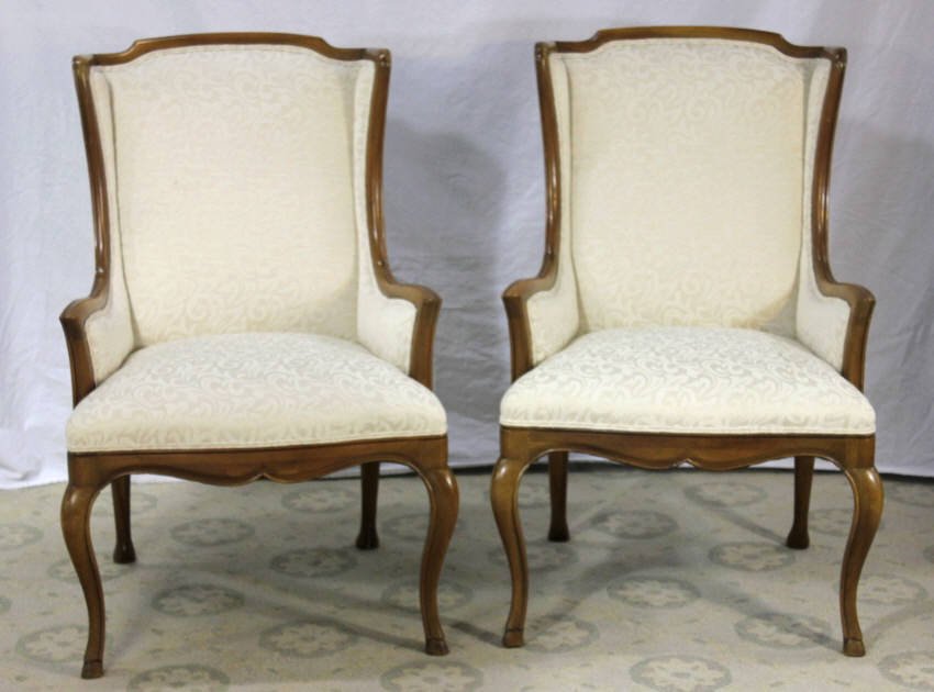 Two French Provincial Upholstered Armchairs: White winged back Height 39 Inches Width 25 Inches Depth 26 Inches
