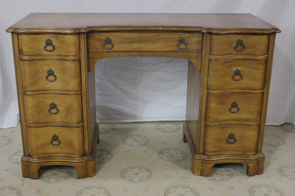 John Widdicomb Serpentine Mahogany 9 Drawer Desk: Height 30 Inches Width 49 Inches Depth 19 Inches Designed by Ralph Widdicomb
