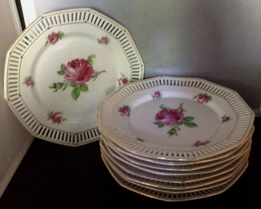 Schumann Bavaria Porcelain Dessert Plates: Reticulated dessert plates w/ rose design. Diameter 8 inches. Property of the Gulbenkian Estate, Pelham NY.