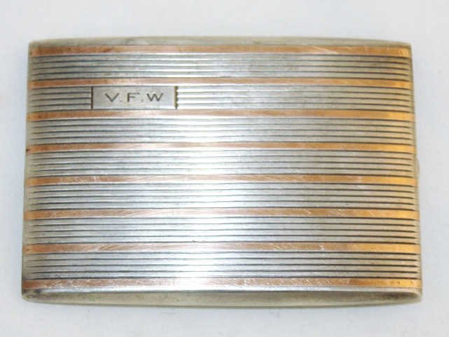 Cartier Silver and Gold Cigarette Case: Lenght 3 Inches Width 4.5 Inches. Engraved V.F.W. Engraved Cartier