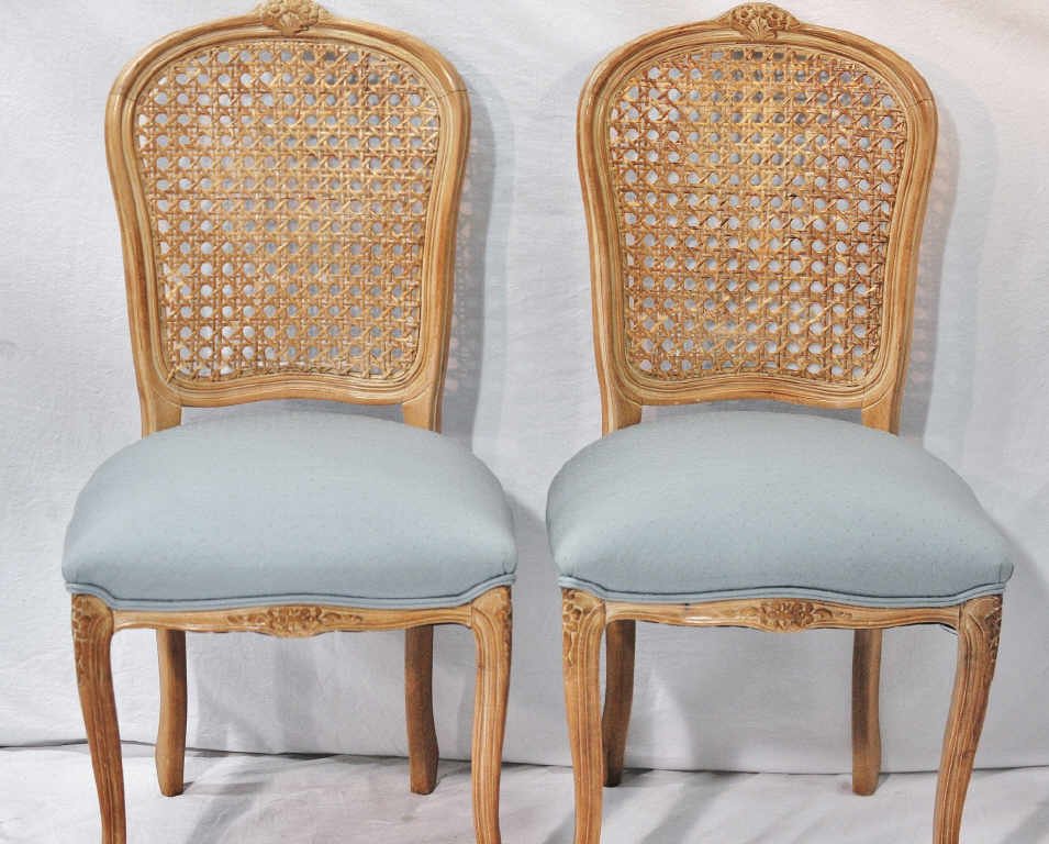 Pair of French Provincial Caned Back Chairs: Upholstered seats. Height 39 Inches Width 20 Inches Depth 16.5 Inches