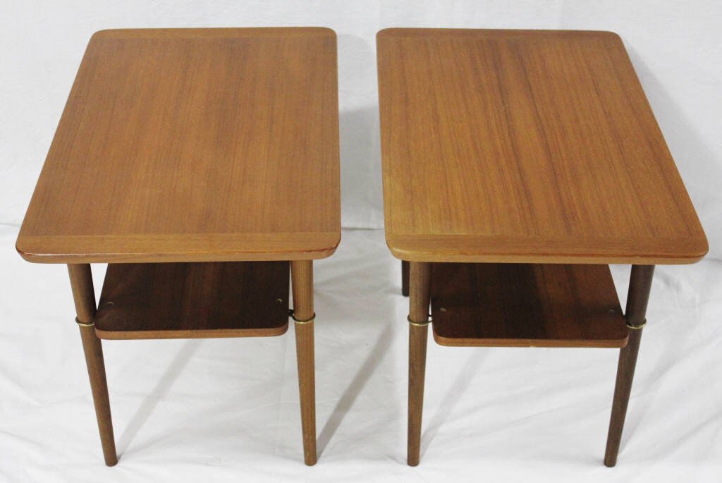 Pair of Ganddal Mobelfabrikk Side Tables: Two tiers. Mid-century modern. Stamped on underside of top tier. Made in Norway Height 19 Inches Width 28 Inches Depth 16.5 Inches