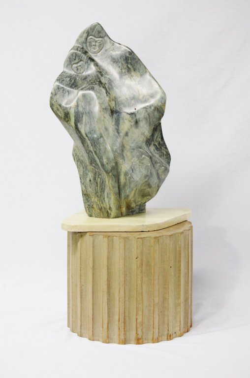 Stone Sculpture with Two Carved Faces: Signed F Peter. Sculpture on stand. Signed F. Petek. Height 18 Inches Width 10.5 Inches