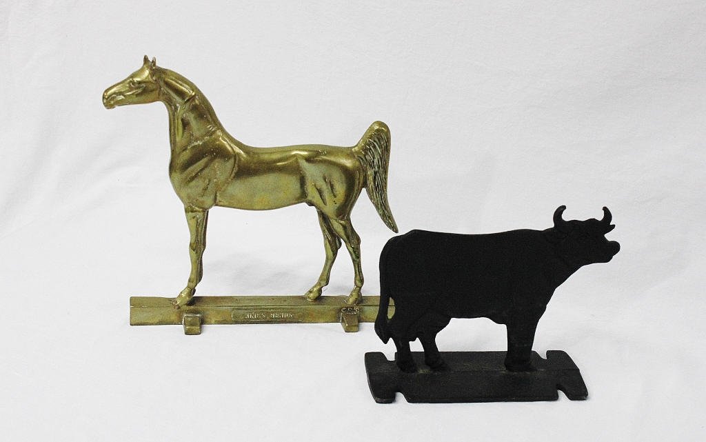 Horse and Cow Doorstoppers: Bronze 1936 Horse labelled "King's Genius", and cast iron cow doorstoppers. Tallest Height 11.5 Inches Width 12 Inches