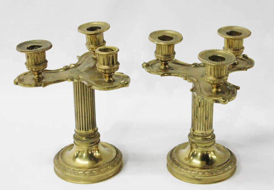 Pair of Three-Candle Candlesticks: No legible marks. Height 8.5 Inches Width 7 Inches Depth 5 Inches.