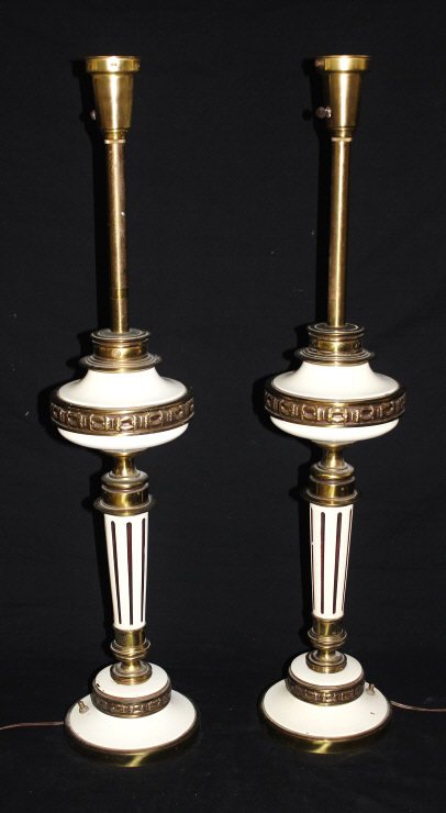 Pair of Empire Style Painted Brass Lamps: Brass column form, partially painted white. Height approximately 21 Inches Largest diameter approximately 7 inches