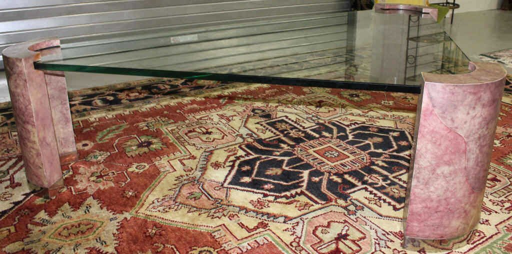 Glass Top Table In the Style of Karl Springer: Triangular shape, faux marble ends Length 56 inches Width 38 inches Height 16.5 inches.