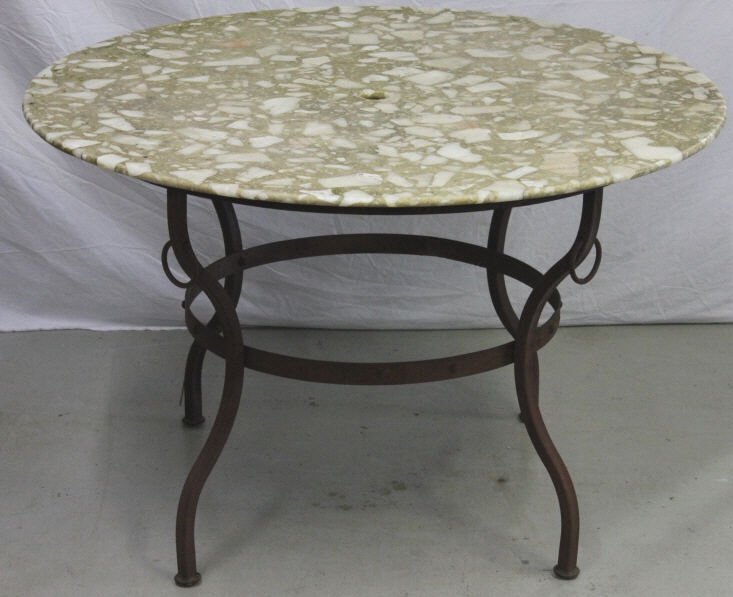 Contemporary Wrought Iron Quartz Top Patio Table: Height 31 inches. Diameter 48 inches. Property of the Gulbenkian estate, Pelham NY.