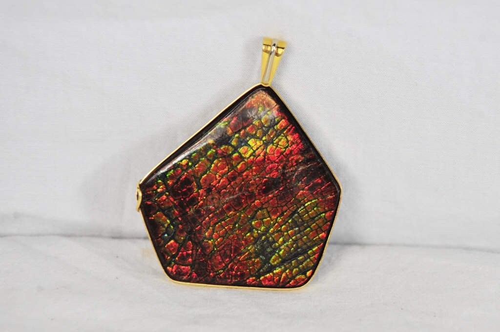 Large Ammolite and Gold Pendant: Marked 750 gold With 2.25 Inches Length 3 Inches