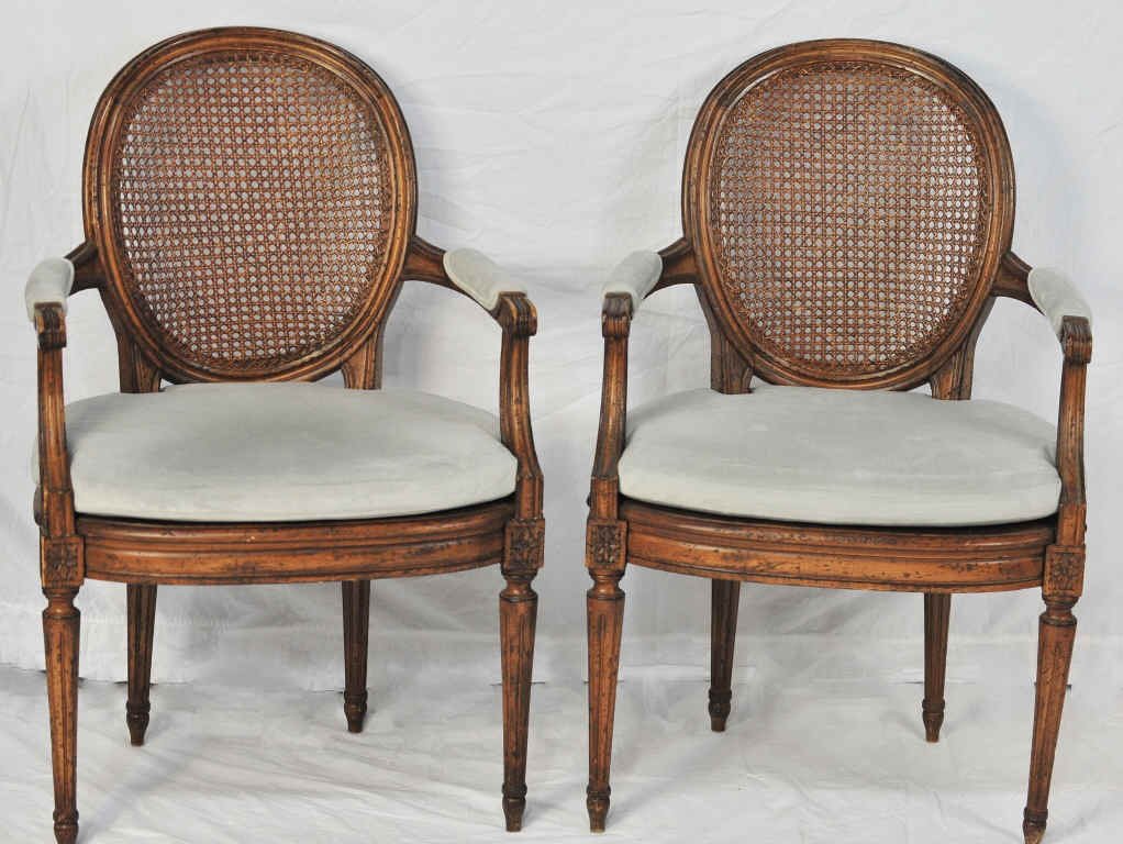 Pair of Louis XVI Balloon Cane Back Armchairs: Newly upholstered in velvet. Height 37 Inches Width 24 Inches Depth 18 Inches