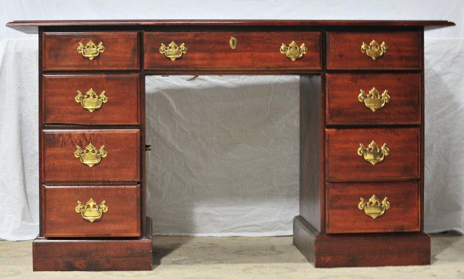 Mahogany Seven Drawer Kneehole Desk: Height 30.5 Inches Width 54 Inches Depth 25.5 Inches