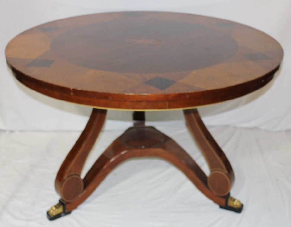 Widdicomb Tripod Inlaid Wood Breakfast Table: Polished wood inlaid wood . Claw foot. Height 30 Inches. Diameter of top 48 Inches. Metal label on underside of table top