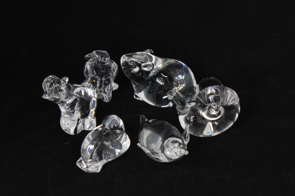 Six Steuben Glass Animal Figurines: Snail, elephant, seal, beaver, and dove hand cooler, and bird. Largest (beaver) Length 5.5 Inches Height 3 Inches Signed