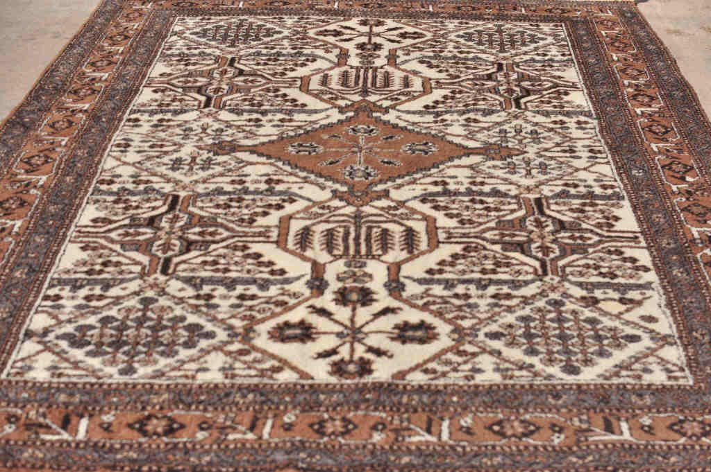 Oriental Beige, Brown, and Grey Carpet: Geometric pattern. 127 Inches by 81 Inches