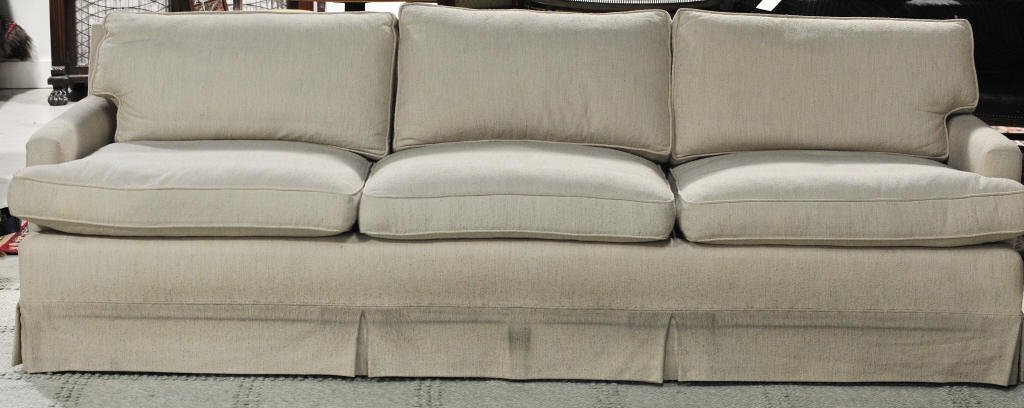Contemporary Cream Raw Silk like Sofa: Three-seat, down cushion couch. Sofa Height 30 Inches Width 94 Inches Depth 36 Inches