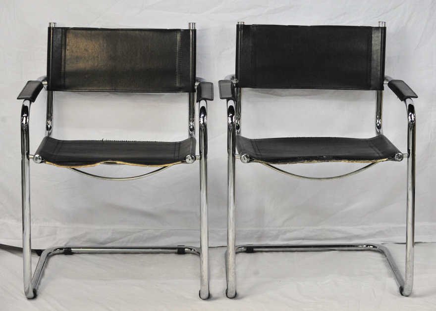 Pair of Chrome and Leather Modern Armchairs: Height 32 Inches Width 23.5 Inches Depth 21 Inches