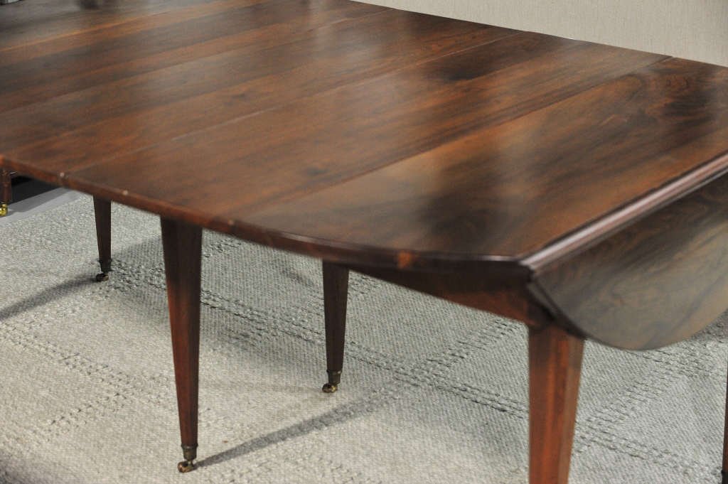 Modern Mahogany Drop Side Dining Table: With three leaves. Height 29 Inches Width approximately 87.5 Inches
