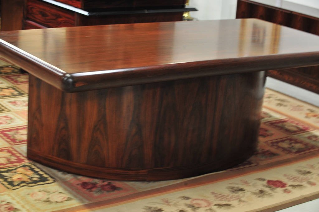 Mid-Century Modern Dyrlund Desk: Three drawers, semi-circular base with rectangular top. Height 28.5 Inches Width 82 Inches Depth 39 Inches