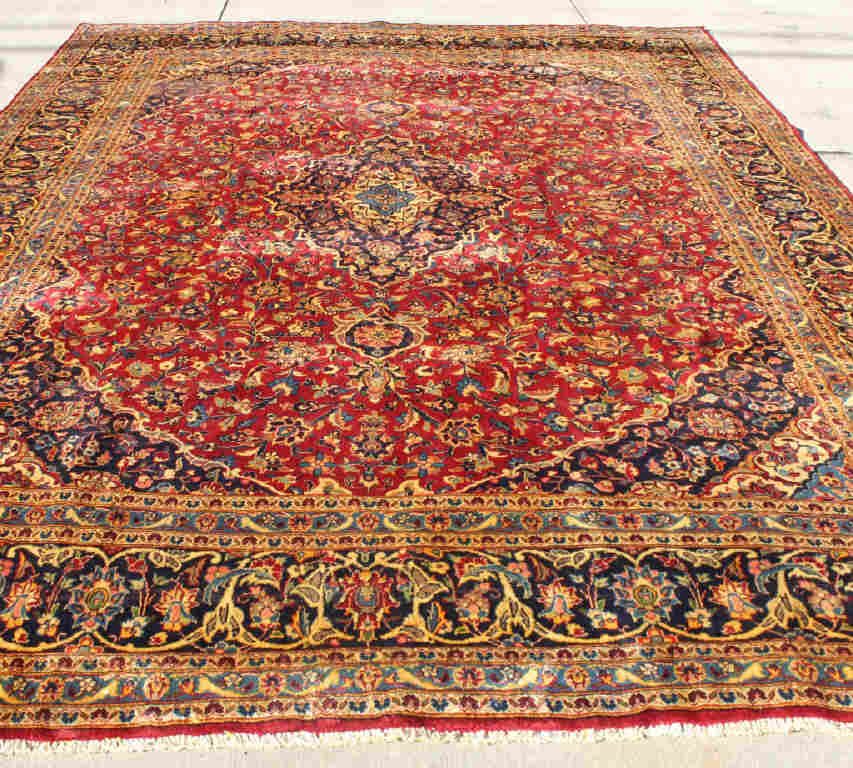 Fine Genuine Persian Hand Knoted Wool Rug: Length 12 Feet 9 Inches. Width 9 Feet 8 Inches.