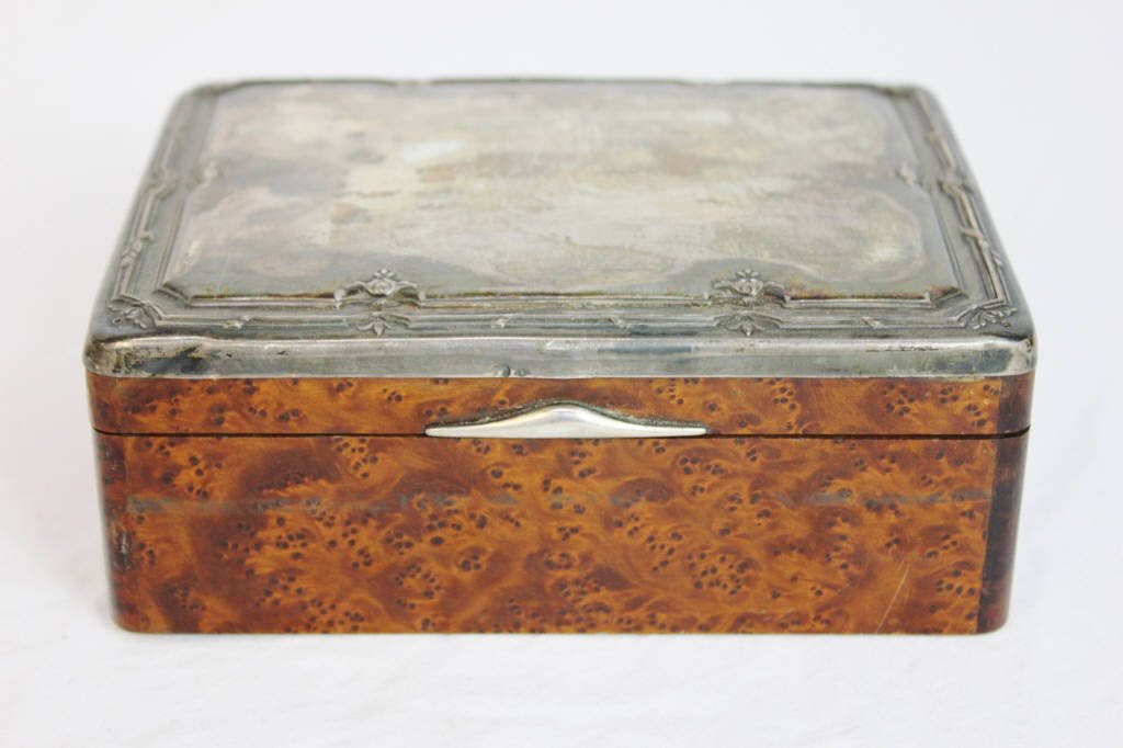 Sterling Silver and Burlwood Box: Hall marked Height 2.5 inches Width 6 inches Depth 4.5 inches