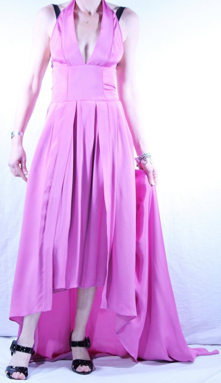 Narciso Rodriguez Pink Evening Gown: Orchid color halter top runway dress. US Size 6 (fits like modern size 2). With black shoulder and back cross strap, 3/4 skirt with fixed wrap around waist train.