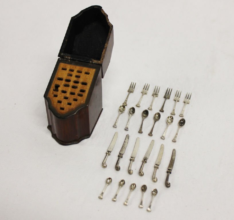 Antique Miniature Cultery Box With Sterling: Wooden minature cultrey Box with 11 Sterling spoons 6 Sterling Forks 6 Sterling Knives Height 2.5 Inches