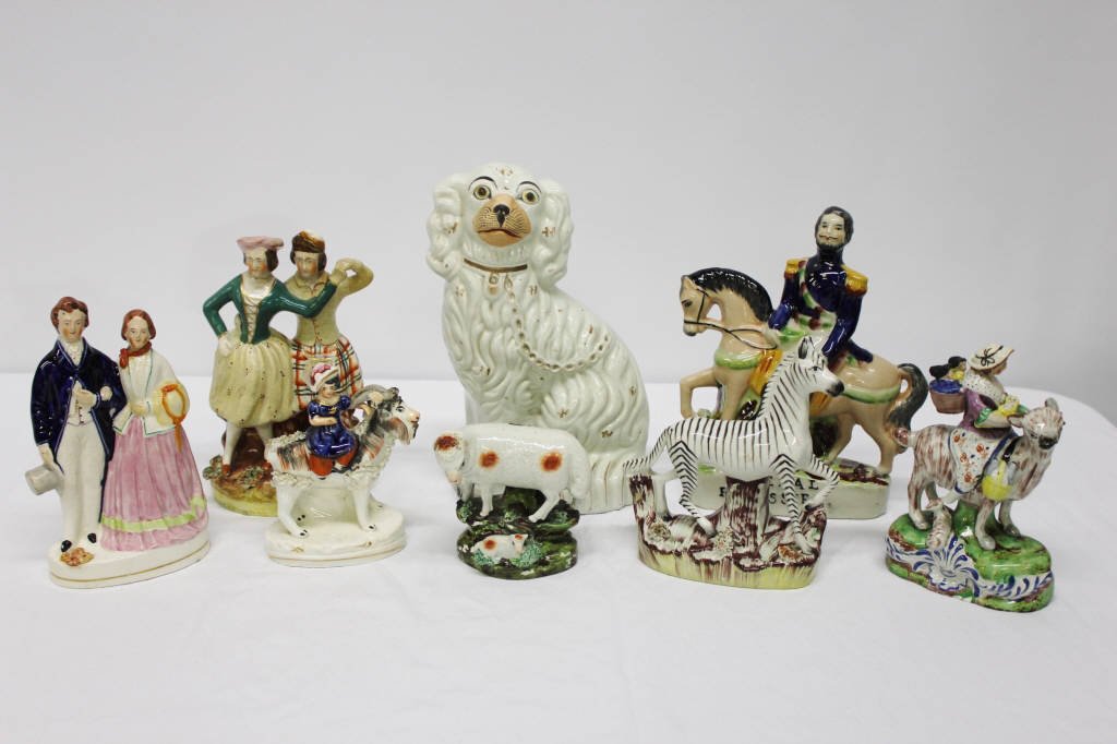 Mixed Lot of 8 Handpainted Porcelain Figures: Largest Height 10.5 inches by Width 6 inches Smallest Height 4 inches by Width 4.5 inches