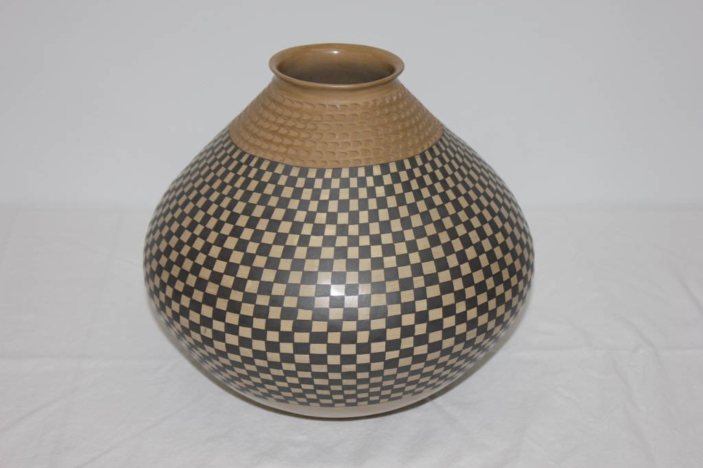 Mexican Casas Grandes Pottery by Sandoval: signed Socorro Sandoval On Tripod Stand Height of Pottery 12 Inches