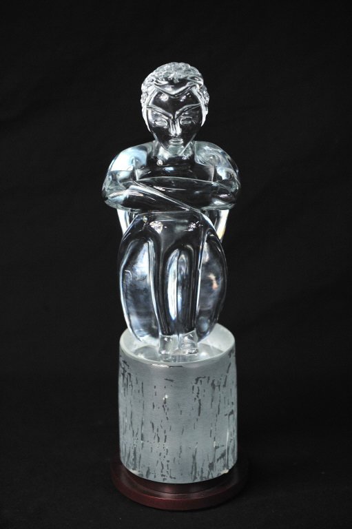 Glass Sculpture of Seated Man: Signed illegible, possibly R. Auotie, Austra, or Arrotis. Height 16 Inches Length 7 Inches