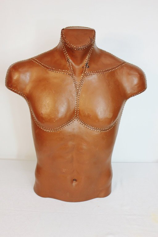 Life-Sized Stitched Leather Male Torso: 'Fusion Specialties' 1993. Height: 26 inches. Width: 21 inches. Depth: 10 inches.