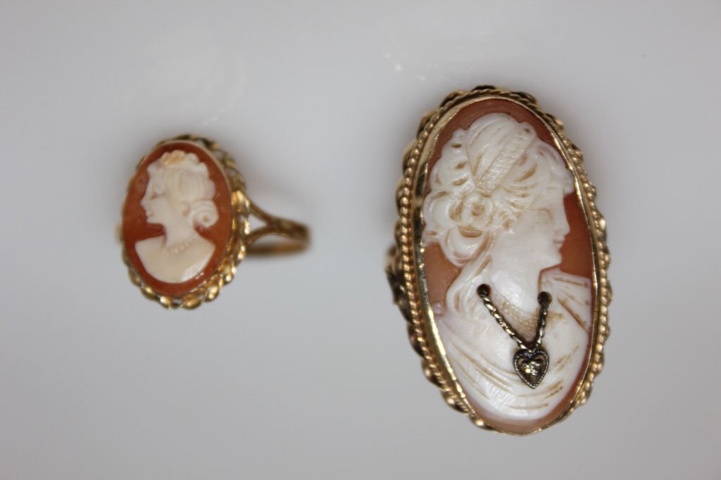 Two 14K Yellow Gold and Cameo Ladies Rings: 6.9 grams total inclusive. weight. Both hallmarked 14K.