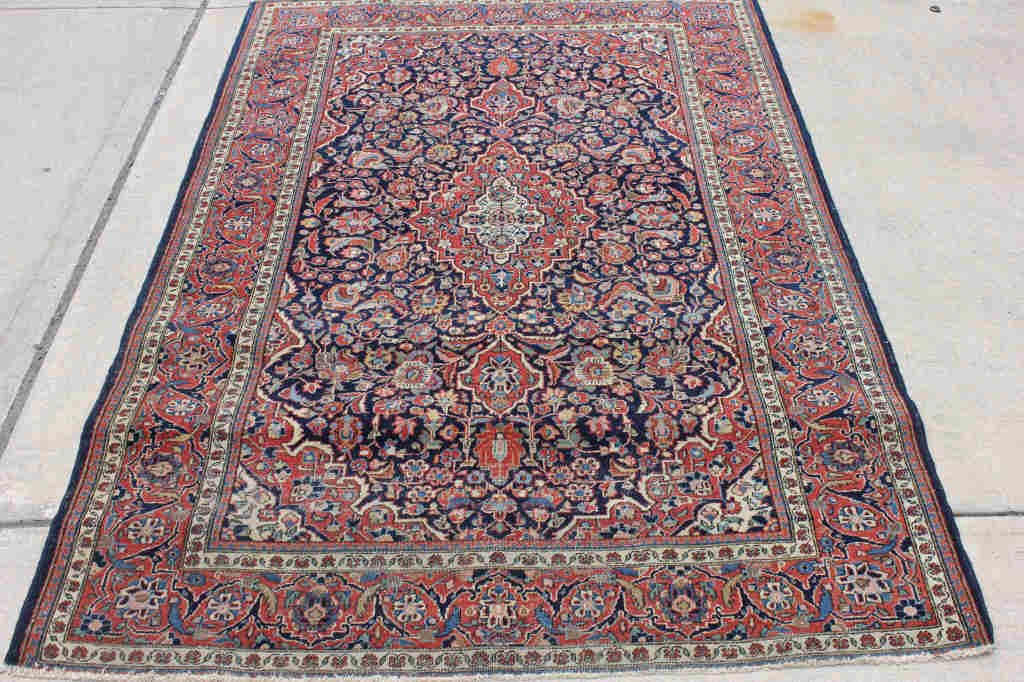 Oriental Rug: 78 inches x 55 inches.