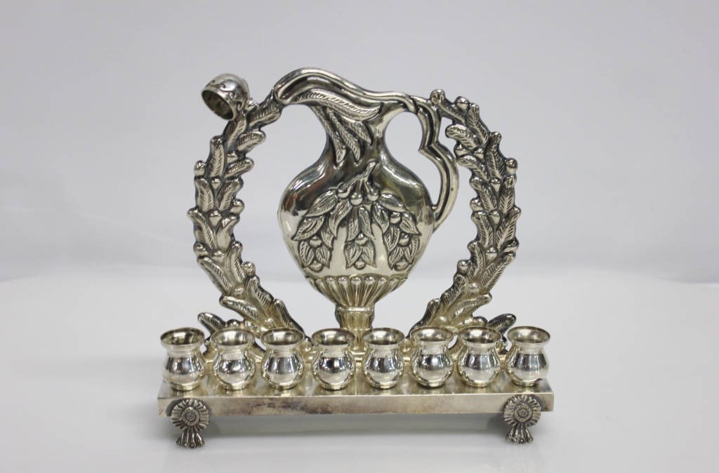 Sterling Silver Menorah Made in Israel: Height: 8.5 inches. Length: 9.5 inches.