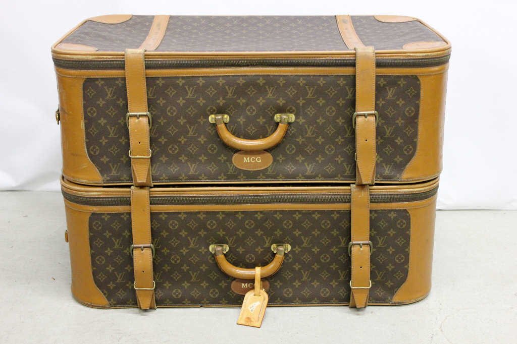 2 Large Monogrammed Travel Suitcase: with rounded corners. In the style of of Louis Vuitton. Height 20 Inches Depth 11 Inches Width 62 Inches