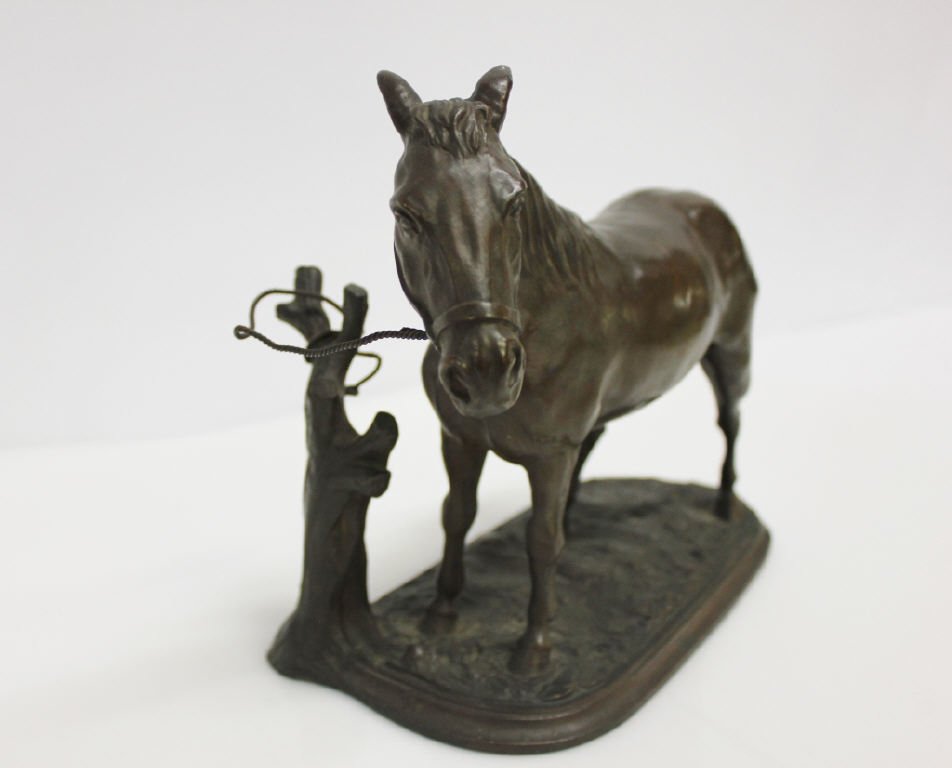 Signed and Dated Bronze Tethered Horse Sculpture: dated 1909 Height: 7.5 inches. Length: 12 inches.