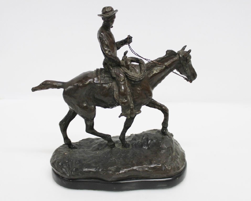 Bronze Western Cowboy Signed C.M Russell: Height: 12.5 inches. Length: 12 inches.