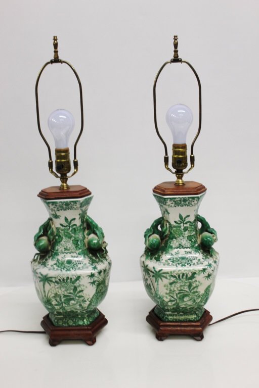 Pair of Green & White Asian Floral Porcelain Lamps: Height: 18 inches each.