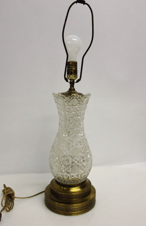 Cut Glass Lamp with Brass Base: no shade. Height: 19 inches. Base diameter: 8 inches.