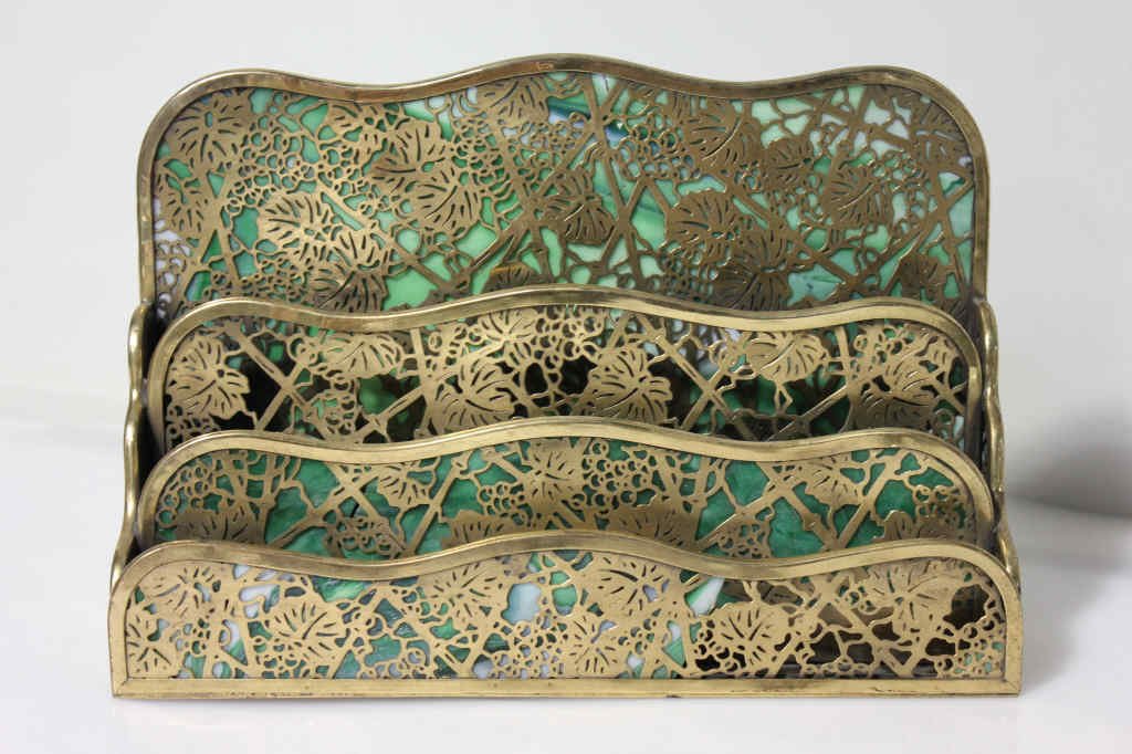 Tiffany Studio Brass and Glass Letter Holder: Some glass Missing /with small cracks Height: 8.5 inches. Width: 12.5 inches. Depth: 3.5 inches.