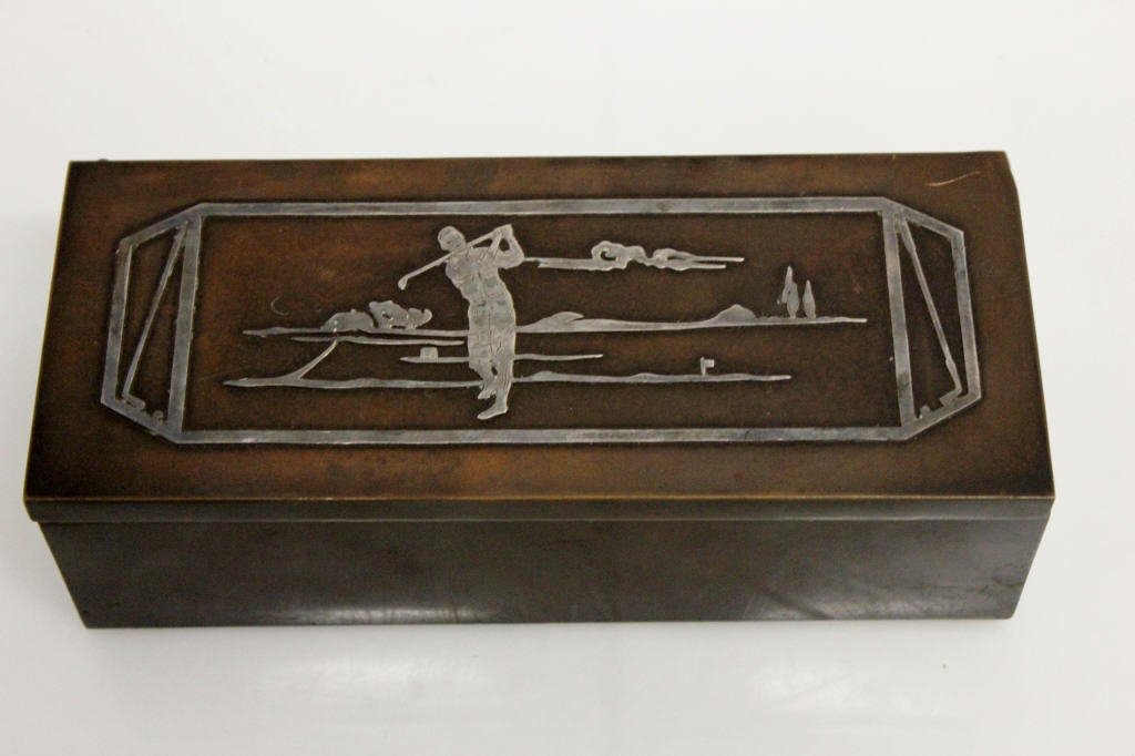 Copper Humidor w Inlaid Silver Depicting Golfer: Height: 2.5 inches. Length: 8.5 inches. Depth: 3.5 inches.